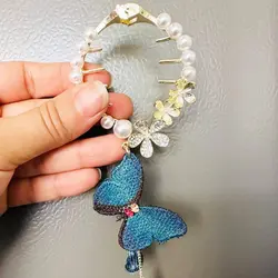 کلیپس گوجه ای مروارید و آویز پروانه گلدوزی زایا