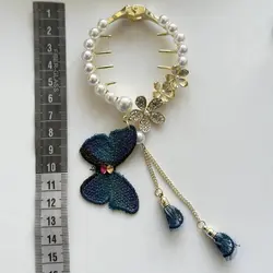 کلیپس گوجه ای مروارید و آویز پروانه گلدوزی زایا