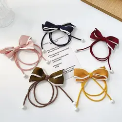 کش مو پاپیون دار پارچه ای دور سفید مرواریدی