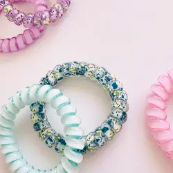 کش مو و دستبند تلفنی گل گلی دو عددی