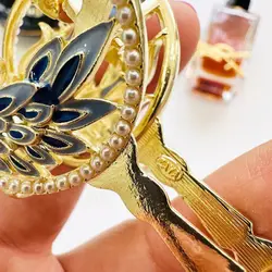 کلیپس فلزی طاووس بادبزنی زایا