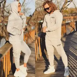 ست زن و مرد کد161 هودی و شلوار طرح اس اچ جنس دورس رنگ ابری