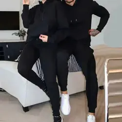 ست زن و مرد کد137 هودی و شلوار طرح ساده جنس دورس رنگ مشکی