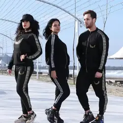 ست زن و مرد کد121 سویشرت و شلوار طرح نوار هندی رنگ مشکی