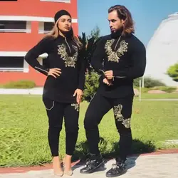 ست زن و مرد کد020 سویشرت و شلوار طرح گل جنس دورس رنگ مشکی