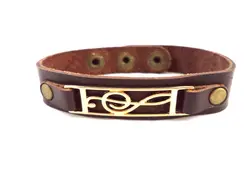 دستبند چرمی اصل استیل 316 طلایی رنگ طرح نت موسیقی چرم قهوه ای رنگ