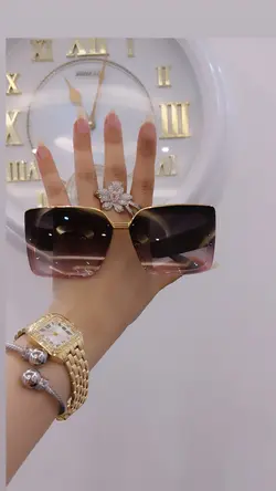 عینک بالا طلایی شانل کد۰۲طوسی صورتی