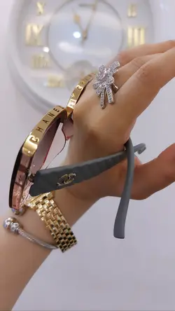 عینک بالا طلایی شانل کد۰۲طوسی صورتی