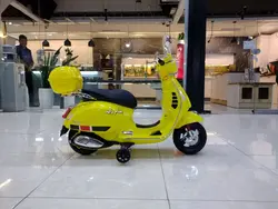 موتور شارژی وسپا ریموت دار باکس دار زرد