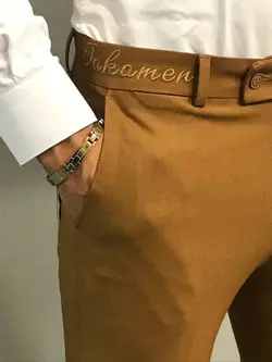 شلوار پارچه ای کد 530 JAKAMAN رنگ خردلی