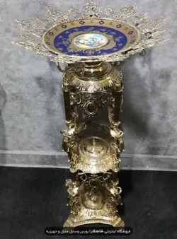 کنار سالنی میوه خوری ایستاده برنجی برنزی مدل ۸ فرشته با ظرف سرمه ای