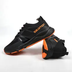 کتونی مردانه سالامون مشکی نارنجی - فروشگاه اینترنتی حاج عمو