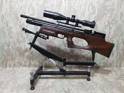 تفنگ پی سی پی کرال پانچر بریکر در حد پلمپ به همراه سایلنسر پایه تفنگ و دوربین