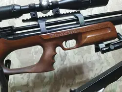 تفنگ پی سی پی کرال پانچر بریکر در حد پلمپ به همراه سایلنسر پایه تفنگ و دوربین