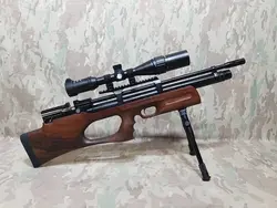 تفنگ پی سی پی کرال پانچر بریکر در حد پلمپ به همراه سایلنسر پایه تفنگ و دوربین