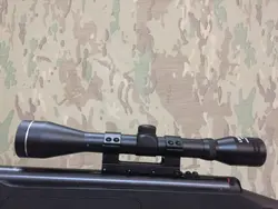 تفنگ بادی هاتسان رنجر آپاچی ١١٠٠ تی اچ دست دوم مكانيزم در حد آكبند همراه دوربين لئوپولد و كيف حمل و بند تفنگ هاتسان