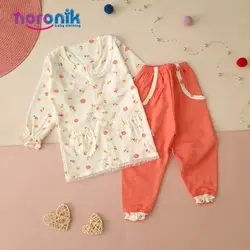 مانتو و شلوار نوزادی دخترانه طرح نباتی پردیس تا 18 ماهست بلوز و شلوار جلو دکمه دار دخترانه