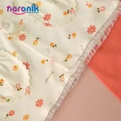 مانتو و شلوار نوزادی دخترانه طرح نباتی پردیس تا 18 ماهست بلوز و شلوار جلو دکمه دار دخترانه