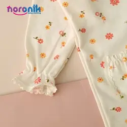 مانتو و شلوار نوزادی دخترانه طرح نباتی پردیس تا 18 ماهست بلوز و شلوار جلو دکمه دار دخترانه