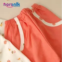 مانتو و شلوار نوزادی دخترانه طرح نباتی پردیس تا 18 ماهست بلوز و شلوار جلو دکمه دار دخترانه