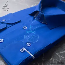 پیراهن مردانه اداری رنگ آبی کاربنی یقه برگردان آستین بلند ساده تک جیب پارچه تترون کد 20288