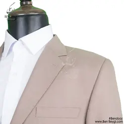 کت و شلوار فرم اداری مردانه پارچه فاستونی طرح کجراه ساده رنگ کرم بانتو دوزی یقه انگلیسی کد RAM5333