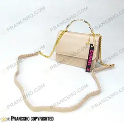 کیف پاسپورتی شنل (CHANEL) دسته فلزی طرح کوکو کرم پنککی