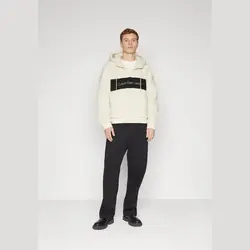 BLOCKING HOODIE – هودی رنگ پوسته تخم مرغ – کلوین کلاین امریکا