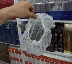 کلاه یک بار مصرف 100 عددی