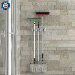 نگهدارنده تی و جارو اسپادانا دیوارینگهدارنده تی و جارو اسپادانا دیواری