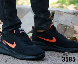 کفش مدل نایک زیره تزریق با کیفیت  مردانه پسرانه به رنگ مشکی نایک نارنجی  با ارسال رایگان کد 3585