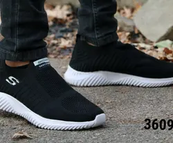 فروش  ویژژژه  این هفته کفش مدل باکیفیت  اسکیچرز راحت و بادوام مردانه پسرانه به رنگ مشکی زیره سفید با ارسال رایگان کد 3609