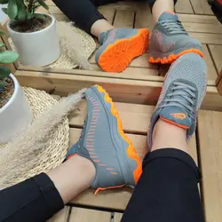 کفش اسپرت دخترانه  مدل نایک با طراحی منحصر به فرد طوسی نارنجی با ارسال رایگان