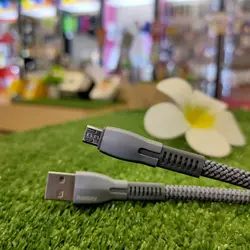 کابل هوشمند دیتا و فست شارژ microUSB ریمکس مدل Gonro 159m با شدت جریان 2.4 آمپر ،سرعت انتقال پایدار 480mbs و دارای مقطع تخت ضد گره بافته شده به طول 1 متر و سری های آلومینیوم ضد اکسیداسیون