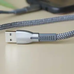 کابل هوشمند دیتا و فست شارژ microUSB ریمکس مدل Gonro 159m با شدت جریان 2.4 آمپر ،سرعت انتقال پایدار 480mbs و دارای مقطع تخت ضد گره بافته شده به طول 1 متر و سری های آلومینیوم ضد اکسیداسیون