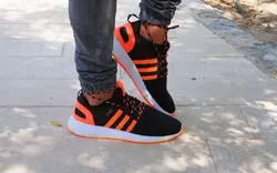 کفش اسپرت مردانه ادیداس فوق العاده شیک و راحت زیره طبی درجه یک مشکی نارنجی