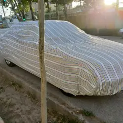 چادر ماشین نخی پشت کرکی مخصوص مخصوص دنا(داخل پنبه ای، ضد خش و مقاوم به آفتاب)(زمینه سفید)