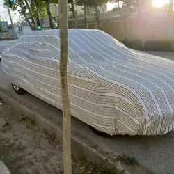 چادر ماشین نخی با ضخامت متوسط (برزنتی و مقاوم به آفتاب) مخصوص پژو 207 صندوقدار