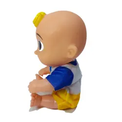 عروسک کوکوملون جی جی موزیکال مدل پسر کچل خندان