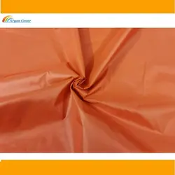 پارچه شمعی نارنجی پشت نقره ای عرض 150