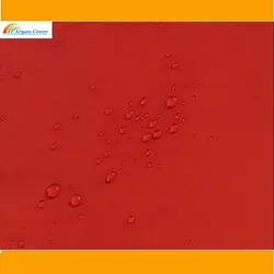 پارچه شمعی قرمز پشت نقره ای عرض 150