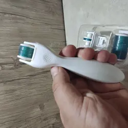 درمارولر سه در یک تیتانیومی derma roller3in1