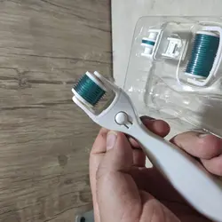 درمارولر سه در یک تیتانیومی derma roller3in1
