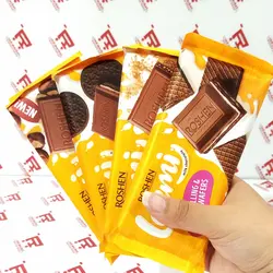 شکلات شیری روشن لاکمی با دانه های کنجد ۹۰ گرمی