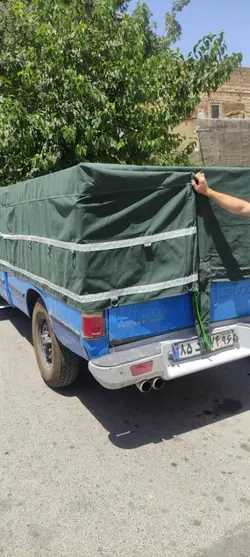 چادر وانت نیسان برزنت روباری جنس معمولی سایز ۳/۵در۴/۵ نواردوزی شده ۴ ردیف قلاب با صلیب پشت چادر