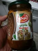 کنسرو مَکدوس (بادمجان شکم پر باگردو وفلفل دلمه وسیر در روغن)