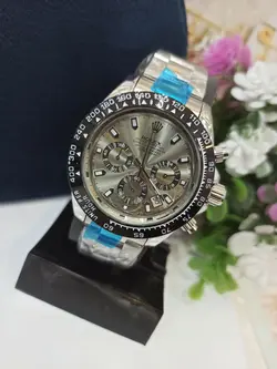 ساعت مچی مردانه سه موتور فعال کرنوگراف بند نقره ای صفحه طوسی برند رولکس ROLEX،تکی به قیمت عمده
