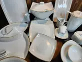 سرویس چینی پردیس طرح شکوفه2026 کف گل 12نفره 105پارچه