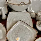 سرویس چینی پردیس طرح سیسیل طلایی کف گل 12نفره