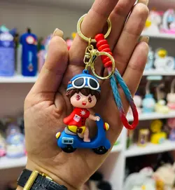 جاکلیدی سیلیکونی طرح پسر اسکوتر سوار